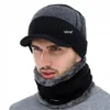 A man wearing a winter hat and scarf set. Produktbild-Vorschau