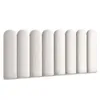A row of white, rounded rectangular wall panels, likely upholstered, arranged in a linear fashion. Anteprima dell’immagine prodotto