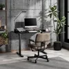 A modern home office setup with a standing desk, computer, and chair. Anteprima dell’immagine prodotto