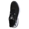 A top-down view of a black and white athletic shoe. Produktbild-Vorschau