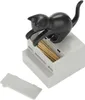 A black cat figurine sits on a white dispenser filled with toothpicks. Podgląd zdjęcia produktu