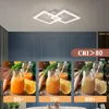 A collage of images showing a modern ceiling light and comparisons of juice colors under different light conditions. Produktbild-Vorschau