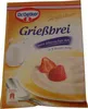 A close-up of a Dr. Oetker Grießbrei (semolina pudding) package, showing the product name, brand logo, and an image of the prepared dish with strawberries. Náhľad obrázku produktu