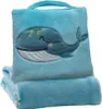 A folded blue baby blanket with a whale design is shown. Produktbild-Vorschau