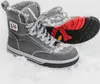 A pair of winter boots in the snow. Produktbild-Vorschau