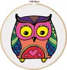 A colorful, cartoon-like owl illustration is displayed within an embroidery hoop. Anteprima dell’immagine prodotto