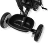 A close-up view of the front basket and wheels of a black tricycle. Produktbild-Vorschau