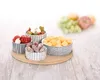 Quatre bols en porcelaine sur un plateau en bambou pour Voir les images du produit 9