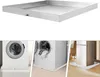 A collage showing a stainless steel drip pan for appliances, with three smaller images demonstrating its use under a washing machine and a refrigerator. Náhled obrázku produktu