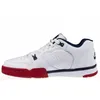 A side view of a white Nike Cross Trainer Low sports shoe with red and navy accents, isolated on a white background. Náhled obrázku produktu