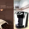 A split image showing text and graphics on the left and a coffee machine on the right, with a bag of coffee beans in the foreground. Produktbild-Vorschau