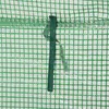 A close-up view of a green mesh fabric with a dark green strap attached. Produktbild-Vorschau