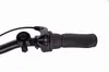 Close-up of a bicycle handlebar with a grip, gear shifter, and bell. Produktbild-Vorschau