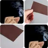 A collage of four images showing a magic trick where smoke appears to come from fingertips, with close-ups of a brown card. Náhled obrázku produktu