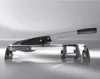 A vinyl and laminate cutter is shown on a reflective surface with a gradient background. Produktbild-Vorschau