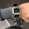 A person wearing a Casio watch and sneakers. Anteprima dell’immagine prodotto