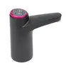 A black electric water bottle pump with a pink accent on top, shown against a white background. Produktbild-Vorschau