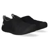 A pair of black slip-on shoes shown from a side-diagonal angle against a white background. Produktbild-Vorschau