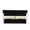 A white and black bed frame with a slatted base. Produktbild-Vorschau