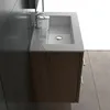 A modern bathroom vanity with a sink and faucet. Produktbild-Vorschau