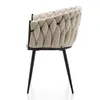 Side view of a modern beige upholstered dining chair with a braided backrest and black metal legs, isolated on a white background. Náhled obrázku produktu