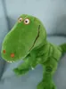 A close-up shot of a green plush dinosaur toy. Anteprima dell’immagine prodotto