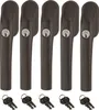 Five brown window handles with silver keyholes are arranged in a row, with five sets of keys below them. Produktbild-Vorschau