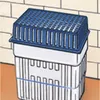 A close-up view of a blue and white dehumidifier placed against a brick wall. Anteprima dell’immagine prodotto