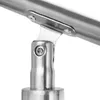 A close-up view of a stainless steel handrail connector, showing the joint between the handrail and a vertical support. Náhled obrázku produktu