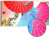 DEQORI Hybrid Leinwand Bild 60x30 cm 'Bunte Schirmvielfalt' Produktbild-Vorschau 1