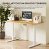 A modern standing desk with a wooden top and white legs, set up in a home office environment with a computer, lamp, and plant. Anteprima dell’immagine prodotto