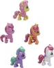 A collection of five small, colorful toy ponies arranged in a scattered pattern against a white background. Produktbild-Vorschau