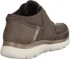 A single brown Skechers boot is shown from the side and back. Náhled obrázku produktu