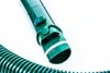 A close-up shot of a green vacuum cleaner hose attachment against a white background. Produktbild-Vorschau