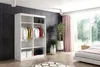 A bedroom scene with a white wardrobe, plants, and a bed. The wardrobe is open, showing clothes hanging inside. Produktbild-Vorschau
