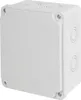 A white electrical junction box with multiple circular knockouts on the side and top, secured with screws. Produktbild-Vorschau