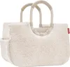 A fluffy cream-colored tote bag with beige handles against a white background. Náhľad obrázku produktu
