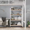 A loft bed with a bookshelf underneath, a sofa, and a rug in a room. Podgląd zdjęcia produktu