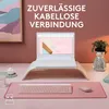 A desk setup with a laptop, keyboard, mouse, and decorative items. Produktbild-Vorschau