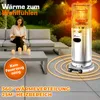 A woman reading a book on a patio next to a patio heater. Produktbild-Vorschau