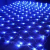 A close-up, overhead view of a net of blue LED lights spread out on a dark surface. Produktbild-Vorschau