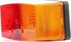 A close-up studio shot of a red and orange vehicle tail light. Anteprima dell’immagine prodotto