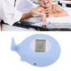 A baby is taking a bath with a whale-shaped thermometer. Produktbild-Vorschau