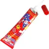 A tube of magic glue with an applicator tip and a red cap. Podgląd zdjęcia produktu