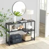 A console table with decorative items and storage boxes in a room. Podgląd zdjęcia produktu