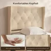 A close-up of a beige upholstered bed headboard with a pillow, and inset images showing a hand pressing into the mattress and a detail of the fabric. Náhled obrázku produktu