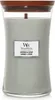 A WoodWick Lavender & Cedar scented candle in a clear glass jar with a wooden lid and wick. Voir les images du produit
