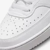A close-up view of the toe and side of a white Nike sneaker. Produktbild-Vorschau