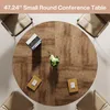 A round conference table with chairs, a laptop, and notebooks. Anteprima dell’immagine prodotto