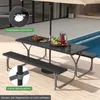 A picnic table set with two benches is set up next to a swimming pool, with drinks and food on the table. Anteprima dell’immagine prodotto